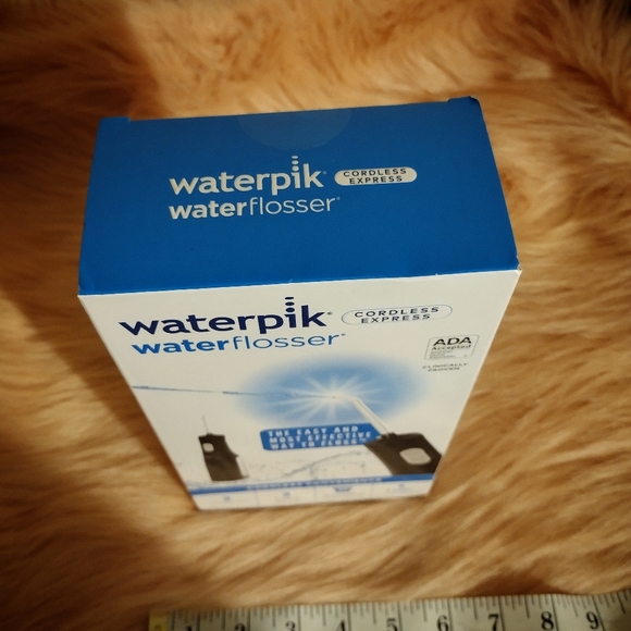 Waterpik Cordless Express Portable Water Flosser Oral Irrigator, Black - Picture 9 of 11